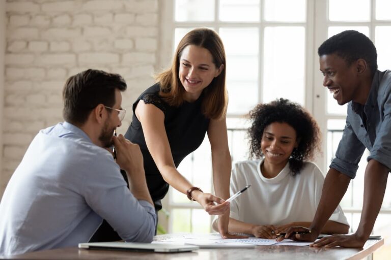 a group of people having a business meeting
